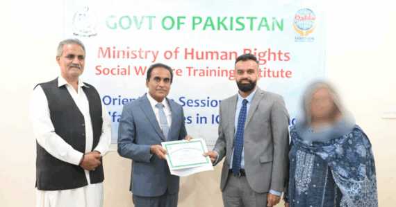 Mr. Chaudhry Muhammad Shawal Azeem, Chairman of Sabiqoon Welfare Trust, receiving Certificate of Appreciation from Secretary, Ministry of Human Rights, Government of Pakistan.